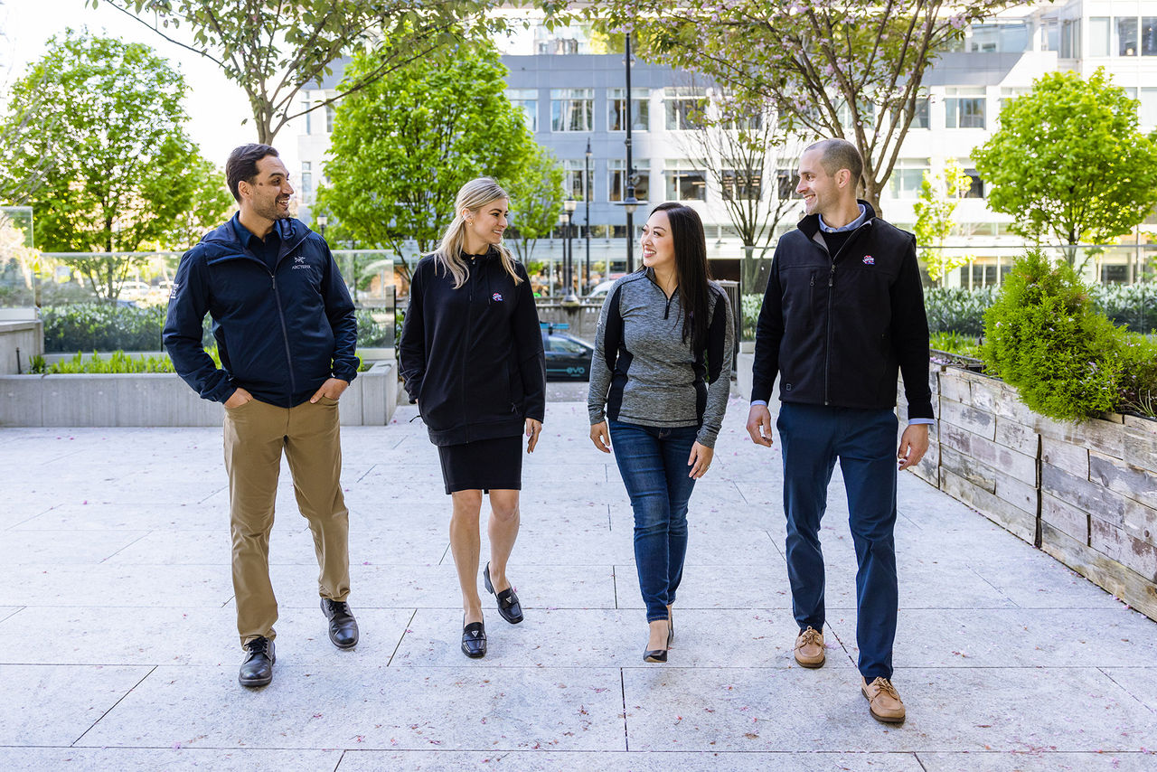 Ledcor employees chatting while walking