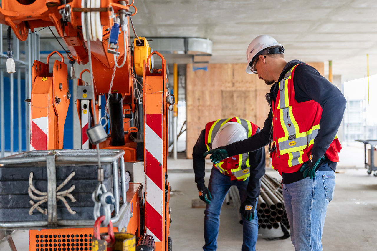 ledcor workers inspecting equipment